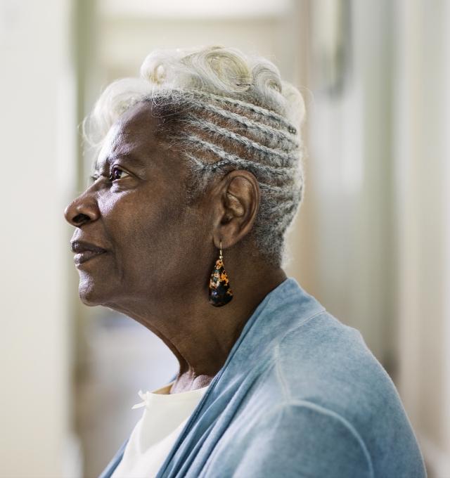 Satisfied woman with earrings